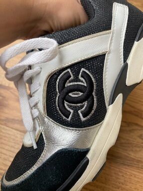 Chunky Black & White Chanel Sneaker with Silver Accents